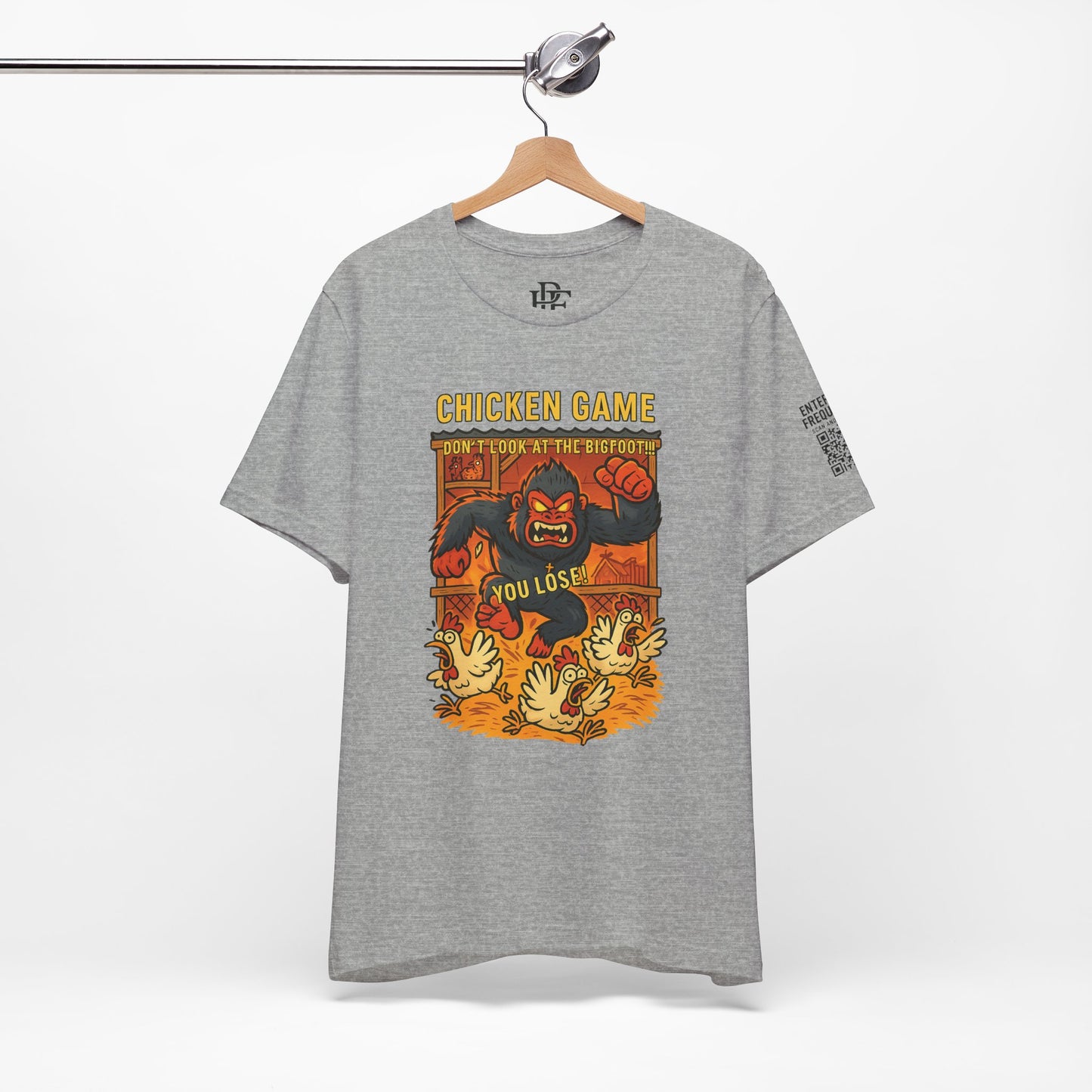 Bigfoot Chicken Game Tee – Humorous T-Shirt for Gamers & Cryptid Fans by Creative Artist Joe Parkhurst